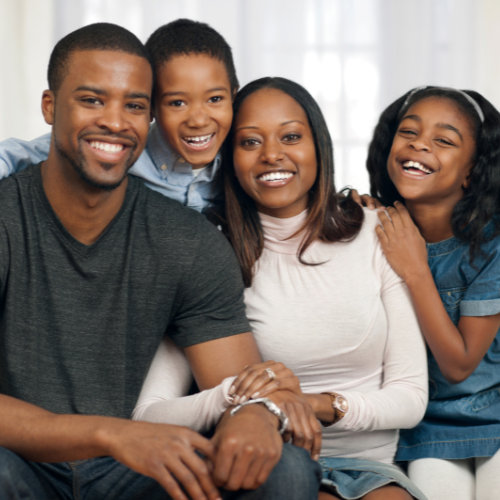 Family Smiling Gather Orthodontics in Holly Springs, NC